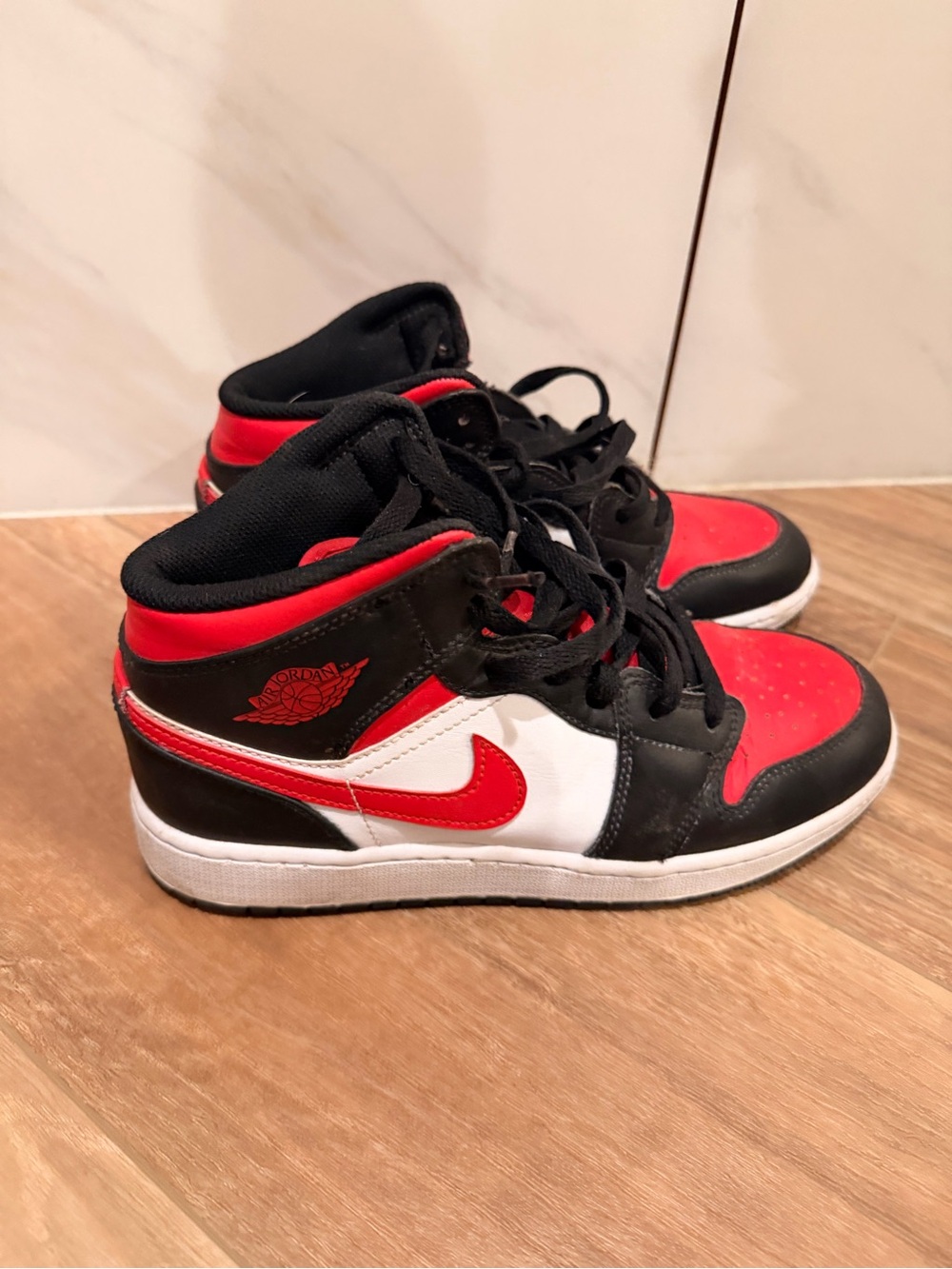 Nike Air Jordan kids Black, Red, and White